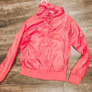 Bright pink Nike windbreaker
